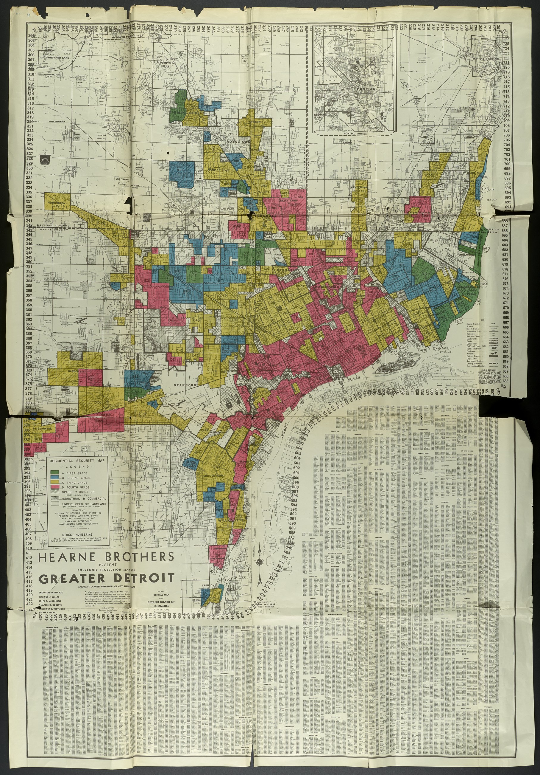 The Home Owners' Loan Corporation residential security map of Greater Detroit, June 1939. The city is drawn street by street and washed in four colours. The legend reads RESIDENTIAL SECURITY MAP and grades them A First Grade, B Second Grade, C Third Grade, D Fourth Grade. The core of the city, including Black Bottom and Paradise Valley, is red.